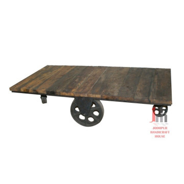 Table industrielle avec roue de wagon
